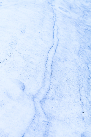 Spring, old, dirty snow. Texture, backgroundの写真素材