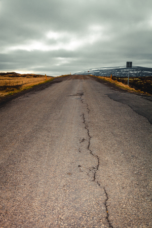 Asphalt road on the beautiful landscape in the east of Iceland.の写真素材