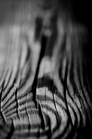 An old board with knots and chips. Wood. Background. Selective focusの写真素材