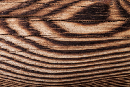 An old board with knots and chips. Wood. Background. Selective focusの写真素材