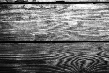 An old board with knots and chips. Wood. Background. Selective focusの写真素材