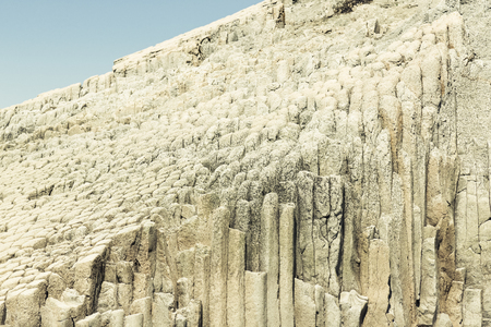 Cape Stolbchaty. Cape on the west coast of the island of Kunashir. It is composed of layers of basaltic lavas of the Mendeleyev volcano.の写真素材