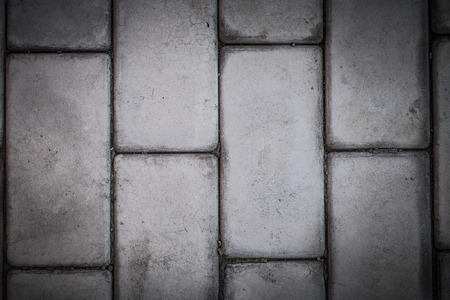 Pattern of brick block on walkway, triangle block is differenceの写真素材