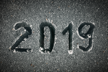 2019 inscription on the glass by hoarfrost.