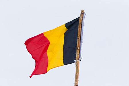 Flag of different Germany on the background of the gloomy sky.の写真素材