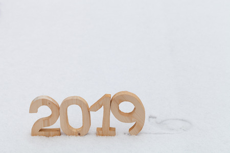 Figures 2019 on the snow. New year and christmas theme.