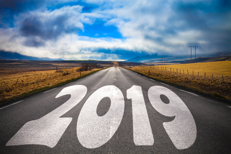 New year and christmas theme: figures 2019 on a road on the beautiful landscape in the east of Iceland. Collage. Toned.の写真素材