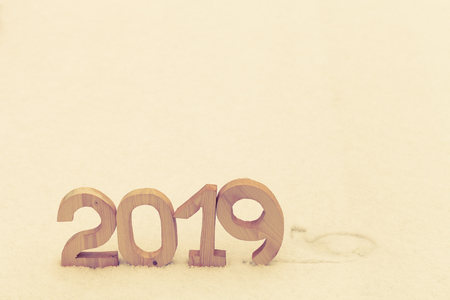 Figures 2019 on the snow. New year and christmas theme. Toned.の写真素材