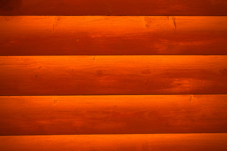 Wooden painted rustic wall of new logs for background. Toned.の写真素材