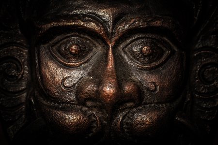 Cast-iron decorative figure of lion. Toned.の写真素材