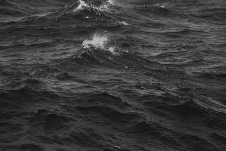 Blue water on the surface of the Pacific Ocean. Natural background. Toned.の写真素材
