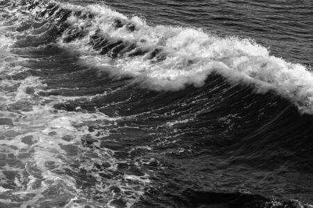 Blue water on the surface of the Pacific Ocean. Natural background. Toned.の写真素材