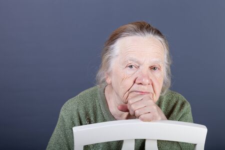 Portrait of elderly woman. Attention.の写真素材