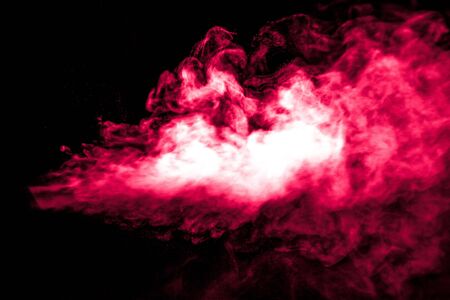 Jet of smoke on black background. Selective focus. Toned.の写真素材