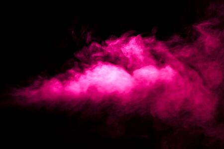 Jet of smoke on black background. Selective focus. Toned.の写真素材