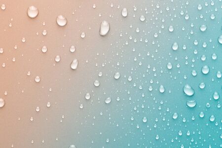 Drops of water on background. Rainbow