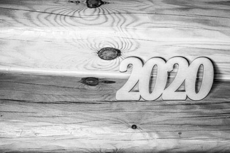 New year composition with wooden figures 2020. Toned.の写真素材