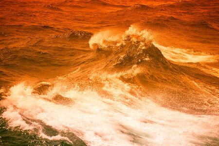 Waves of stormy cold sea on the south of Iceland. Toned.の写真素材