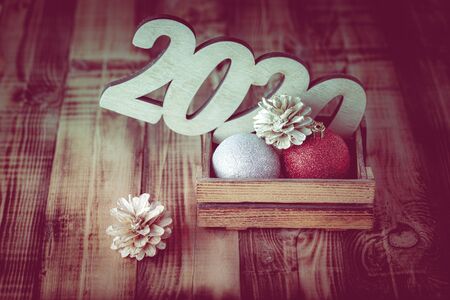 New year composition with wooden figures 2020. Toned.の写真素材