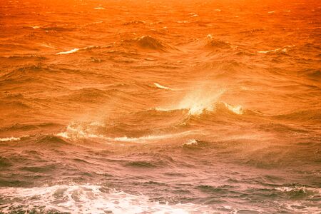 Waves of stormy cold sea on the south of Iceland. Toned.
