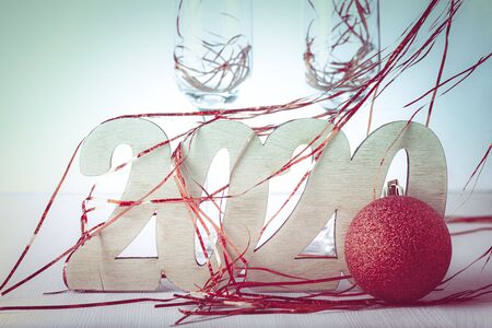New year composition with wooden figures 2020. Toned.の写真素材