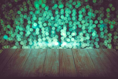 New year abstract bright background. View from wooden table. Collage. Toned.の写真素材