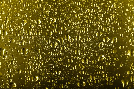 Drops of water on a glass background. Selective focus.