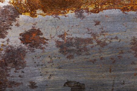 Abstract pattern of rust on old metal textured surface for background.