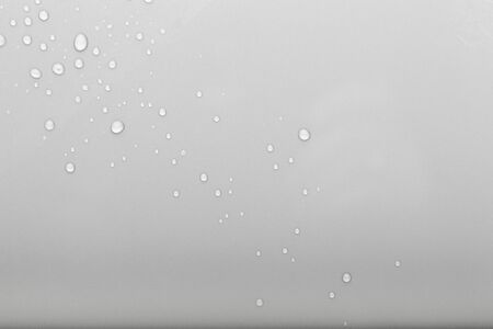 Drops of water on a color background. Selective focus. Gray.の写真素材
