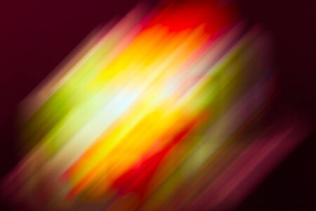 Bright colored blured brushstrokes as multicolored flashes for an abstract background. Toned.