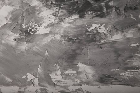 Textured plastered background with a variety of arbitrary stains. Gray.