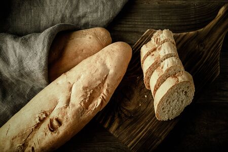 Rustic composition with a rough linen napkin. Toned.の写真素材