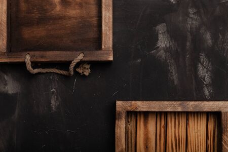 Handmade wooden rustic items on a plastered textured table