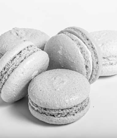 Colorful cake macaroons on a light background. Toned.の写真素材