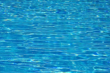 swimming pool with sunny reflections