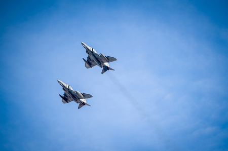 PIRAEUS, GREECE  - NOVEMBER 8: Two McDonnel-Douglas F-4 Phantom Cold War-era fighter jet aircraft performing at Aviation showのeditorial素材