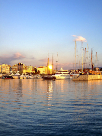View of Pasalimani marina at sunset. Piraeus city, Greece.の写真素材