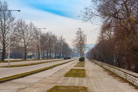 Empty streets  for cars, bikes and pedestrians in light foggy day. Ioannina. Greeceの写真素材