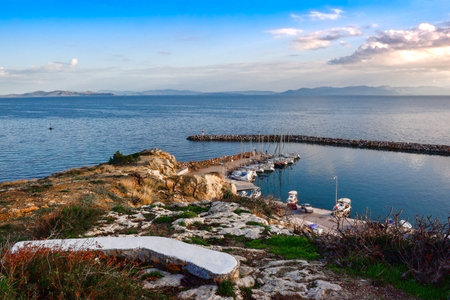 Above view of the beautiful Marina in Rafina city ,Greece, piers,docks,docked yachts and commercial area, in the new small port near the big old oneの写真素材
