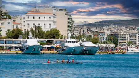 Kayaking lessons and luxury yachts in marina Zeas at Piraeus port in Greece