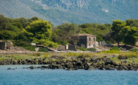 Old stone house on a greek small island, Lihadonisia islands, Greeceの写真素材