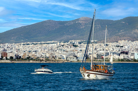 Motor and sail boats going to marina Zeas, Piraeus city, Greeceの写真素材