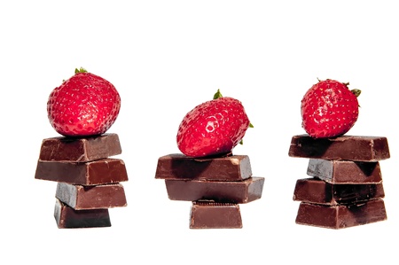 Strawberries and chocolate bars isolatedの写真素材