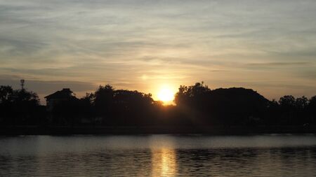 sundown light reflect on swampの写真素材