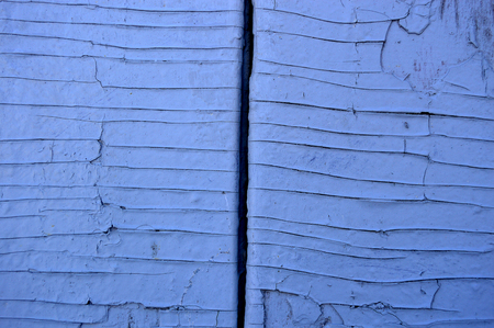 Chapped white paint on the boardsの写真素材