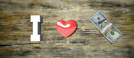 The inscription "I love money" on a wooden backgroundの写真素材