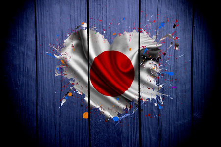 Flag of Japan in the shape of heart on a dark backgroundの写真素材