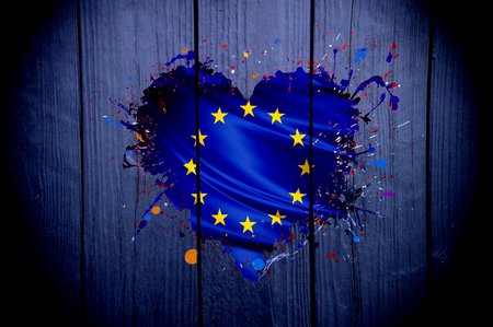 European Union flag in the shape of a heart on a dark backgroundの写真素材