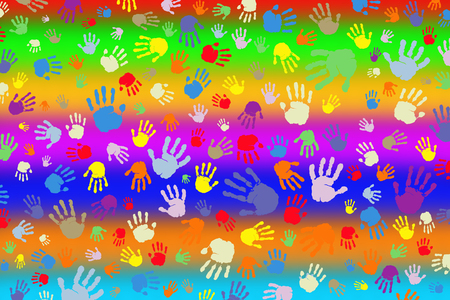 Background of many color prints of hands on a rainbow backgroundの写真素材