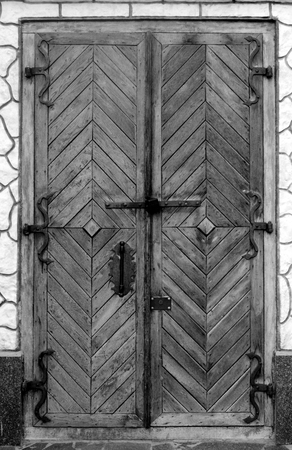 Old forged wooden doorの写真素材
